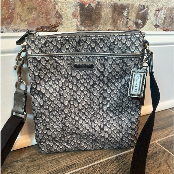 Handbags - Coach snake print swing back crossbody purse.